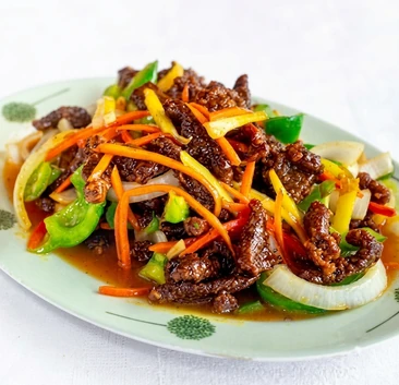 Crispy ginger beef strips glazed in sweet tangy ginger sauce at Szechuan Kitchen, Broadway Avenue Saskatoon