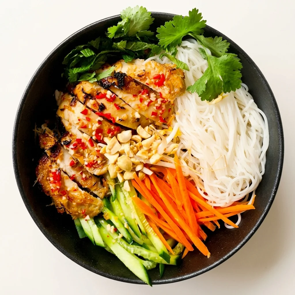 Vietnamese vermicelli noodle bowl with fresh vegetables, herbs and a spring roll at Szechuan Kitchen, Broadway Avenue Saskatoon